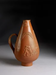 Piriform jug with applied decoration of leopard or cheetah attacking a convict, drunken Pan raping a maenad