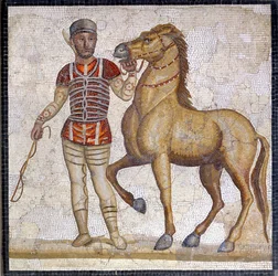 Representation of the four factions of the Roman circus: the Reds (factio russata). The factions were clubs engaged in circus competitions in the High Roman Empire (1st century AD) and characterized by a color. Mosaic, Rome, Museo Nazionale Romano.