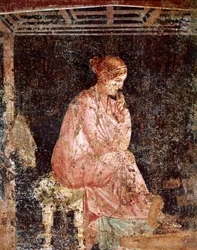 Roman Art: “Young Woman Sitting”. Roman fresco in the third Pompeian style from Pompeii, 40-60 AD