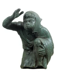 Roman Art: Bronze Statuette of Black Slave Kneeling and Blowing
