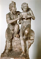Statuette of the god Pan teaching the flute to his eromenos, the shepherd Daphnis. 1st century BC. Roman marble sculpture after a Greek original. National Archaeological Museum of Naples - Pan and Daphnis (or Olympus). Roman copy after a Hellenistic