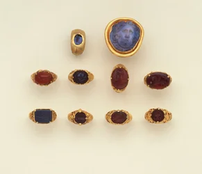 A Roman gold and chalcedony intaglio ring, a large Roman blue-grey chalcedony Medusa head cameo and a selection of rings, two rings in the Seljuk style