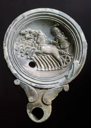 Oil Lamp Depicting a Racing Carriage with Four Horses