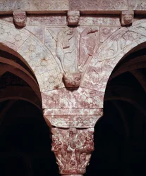 Symbols of evangelists John and Marc, carved on the tribune of the Priory (detail)