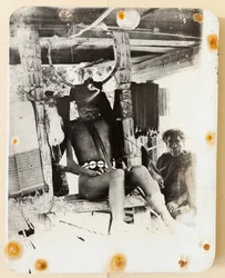 Ifugao corpse in the death chair, 1919