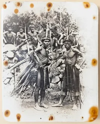 Two Ifugao dressed for the cock fight dance
