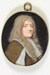 A gentleman dressed in white