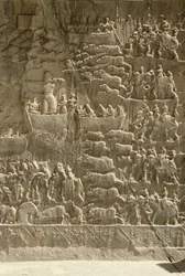 A royal boar hunt, possibly depicting Khosrow II shooting an arrow from a boat, relief from the side of the aivans, c.620