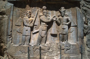 Relief outside the grottoes depicting the investiture of King Ardeshir II (379-383), from the Sassanian grottoes of Taq-e Bostan