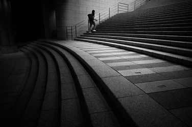 Man Ascending Urban Steps