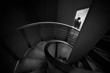 Solitary Figure Spiral Stairs