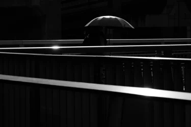 Solitary Umbrella Walk