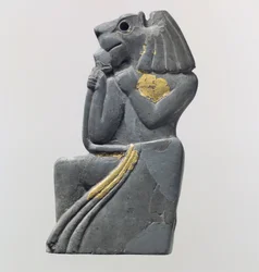 Plaque fragment: kneeling lion-headed figure, c.18th century BC
