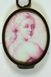 A lady looking over her right shoulder