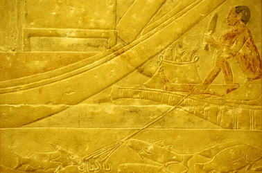 Ancient Egypt, Wall carving/painting, Mastaba/Tomb of Idout, Saqqara, 2323-2150 BC, A fisherman scaling fish and holding a four-pronged spear