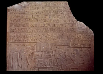 Ancient Egypt: funerary stele covered with an inscription in code language in the form of hieroglyphs. Paris, Louvre Museum
