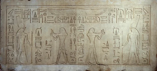 Egyptian antiquity: limestone stele depicting King Sesostris III as a young man, on the right, an aged man offers bread and cake to the god Montu
