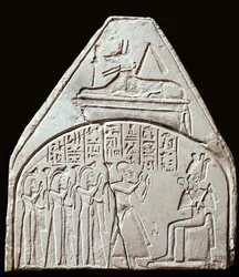 Ancient Egypt: stele fragment representing the worship of the god Osiris. Above it is representing Anubis. Paris, Louvre Museum