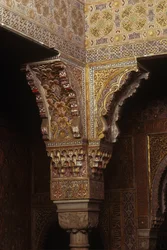 Detail of a polychrome capital in the baths