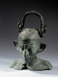 Bronze head-shaped vase: bust of Syrian slave (?). 2nd or 3rd century AD. Paris, Musee du Louvre