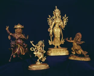 Tibetan figures: Vajravarahi dancing on a human corpse; figure of Padmapari; figure of Beg-tse; figure of Dam-can Dor-je Legs-pa riding a horse