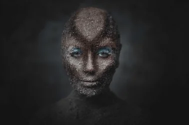 Earthy Figure Blue Gaze