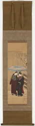 A Girl and a Man Walking in the Snow
