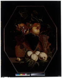 A Still Life with Pomegranates and Grapes in a Basket