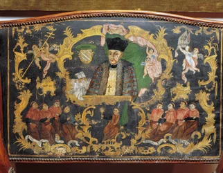 Depiction of Bishop-Rector of University, detail from back of painted leather chair from College of St Bartholomew in Salamanca, Spain