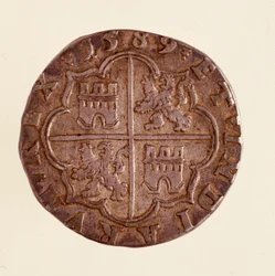 Silver coin (8 reales) from Spain: reign of Philip II (1556-1598). 1589 Diameter 3.5 cm