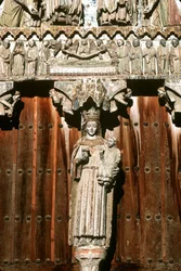 The west portal with statue of Madonna and Child and relief of the Last Judgement