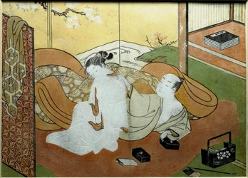 Couple of lovers lying in an interior with screen, calligraphy box. Nishiki-e print by Suzuki Harunobu