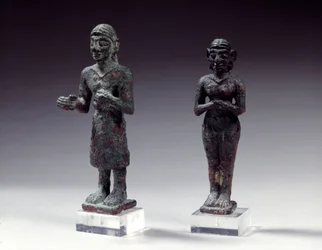 Statuettes of Worshipers and Goddess in Bronze