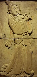 Terracotta stele with musician, Tang Dynasty (618-907), discovered in Shaanxi Province, Steles Forest Museum in Xian. Photography, Leonard de Selva, China, 2006