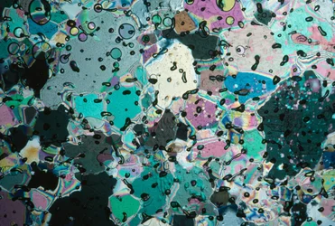 Ice crystals in a core reflect colors at different angles
