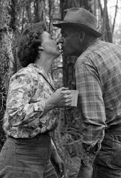 Mildred Cooper, a 43 year old grandmother and truck driver, kisses her husband