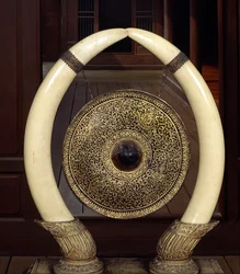 A Gong Hanging from Elephant Tusks
