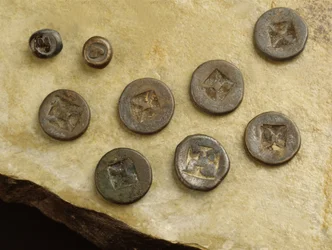 Money with flower and namo marks from the Srivijaya Kingdom