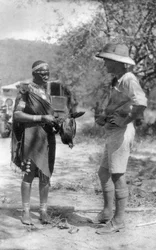 Errol Hinds making a deal in chickens, Wankie to Victoria Falls, Southern Rhodesia, 1925-1927
