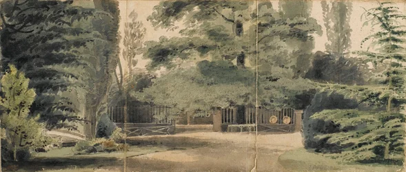 Paths and a fence beneath trees in the grounds at Merton