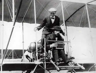 Thomas E. Grant with Mr Lewis Turner in a Flying Machine to Photograph the Eclipse, 1912
