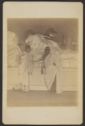 Two Male Students in Grecian Costume Before a Plaster Cast of the Three Fates from the Elgin Marbles