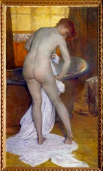 The bath. Scene in a bathroom: A woman out of the bathtub wipes her naked body with a towel
