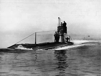 A British submarine running on the surface of the water