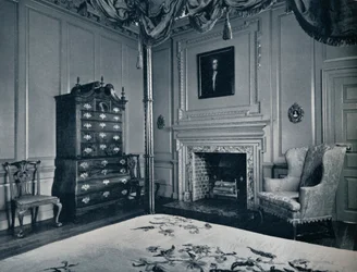 A New England Chest-on-Chest with Bombe Base in one of the bedrooms of the palace of Williamsburg