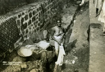 A Washerwoman, Sierra Leone, 20th century
