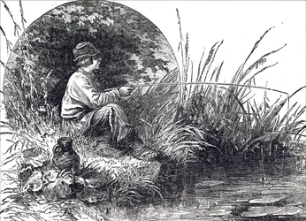 A young boy fishing