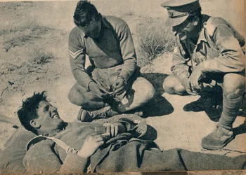 Ambulance Men with a Wounded Anti-Tank Gunner