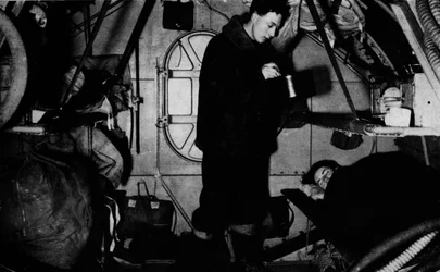 An RAF rigger serving breakfast at 6.30 am