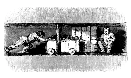 Boy pushing a truck loaded with coal from the coal face to the bottom of the pit shaft, c1848